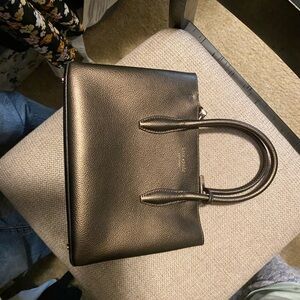 Kate Spade purse with crossbody strap, great condition. Bronze color.